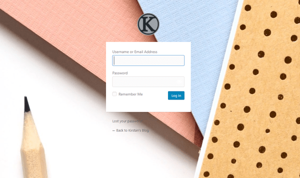 Screenshot of a custom login screen made using Branda and an image of some notepads.