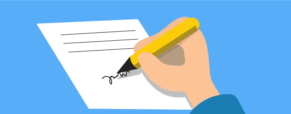 Image of hand writing on paper.